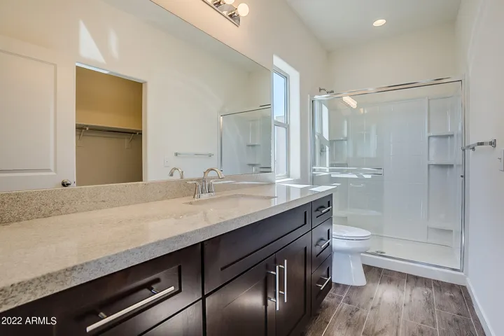 Photo from previous construction. Same floor plan. Cabinets will be white.