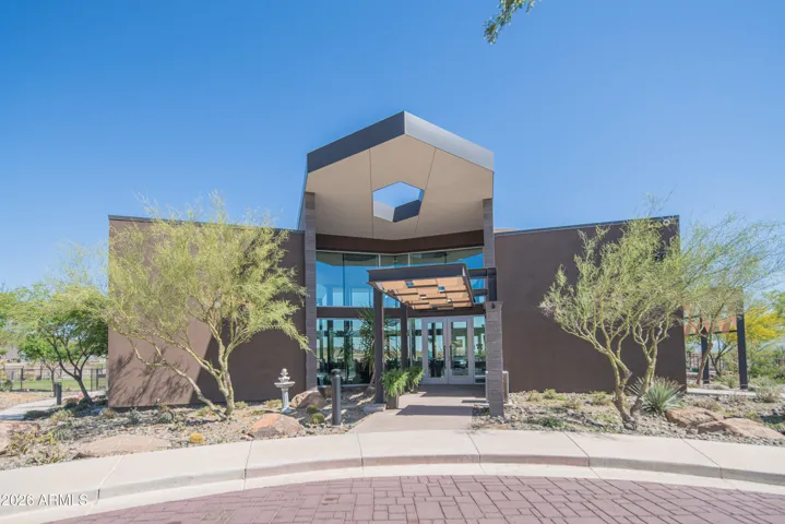Contemporary community center featuring modern architecture and gathering spaces. A key amenity offering social events & heated saltwater pool. Walking distance from your new home.