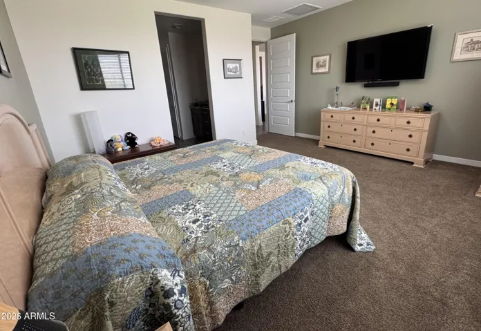 Ample space in this light, open primary suite