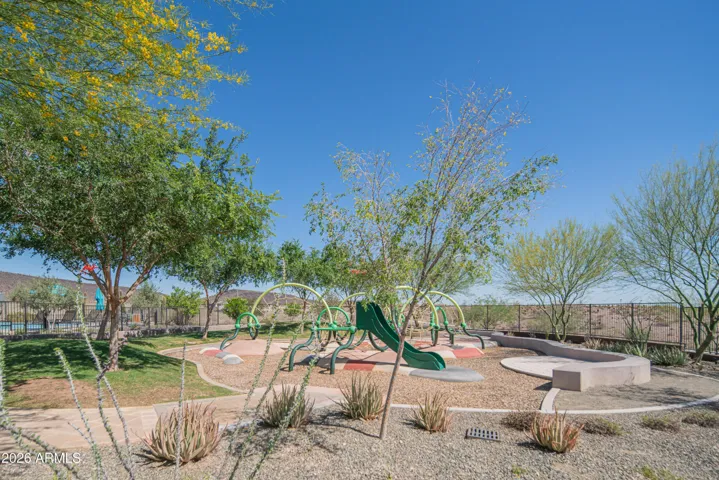 One of many community parks with playground equipment, green space, and seating areas. Perfect for outdoor recreation and enjoying the active lifestyle this Peoria community offers.