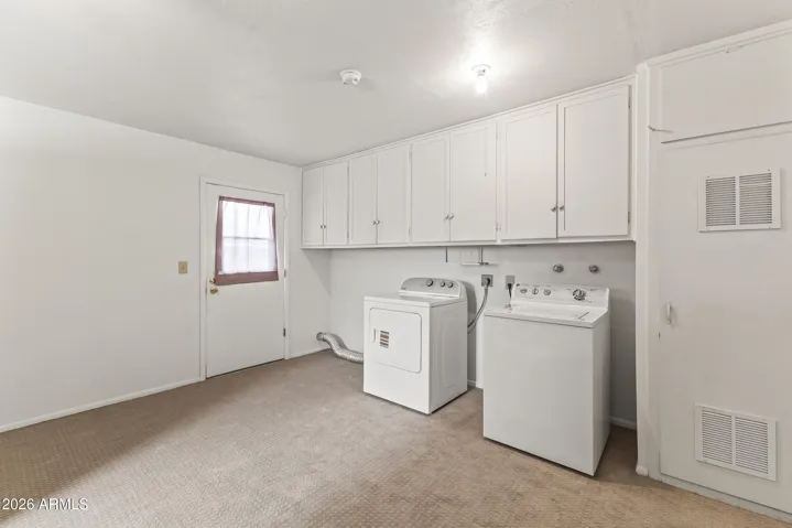 Laundry room, looking towards back yard door