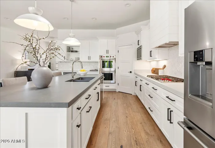 Wolf Gas range and Wolf double wall oven