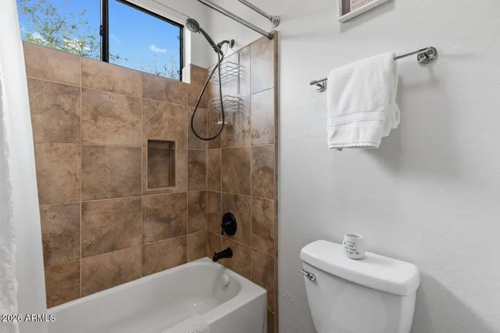 Bathroom between two bedrooms on separate wing of the Home.