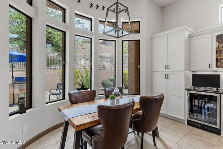 Overlooking your outdoor BBQ and pool / patio. Great for indoor & outdoor dining.