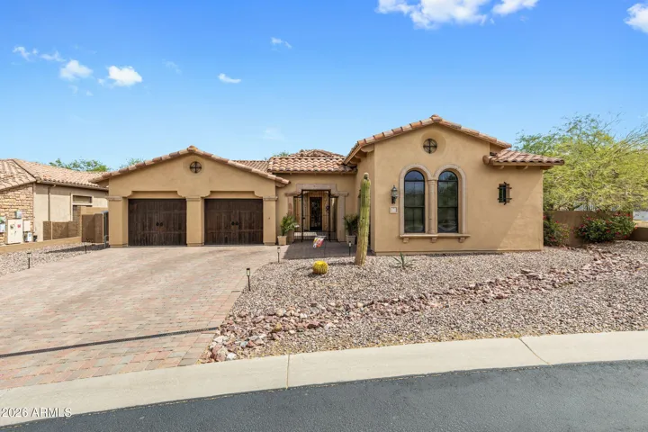 This Enchanted Home on a large premium corner lot offers privacy & tranquility!