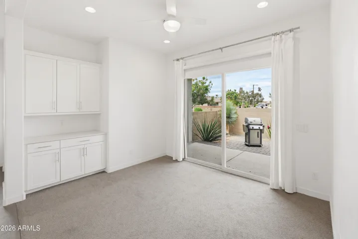 Den/Flex room with private access side yard