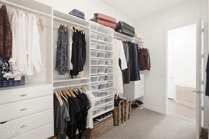 Walk through closet into laundry room