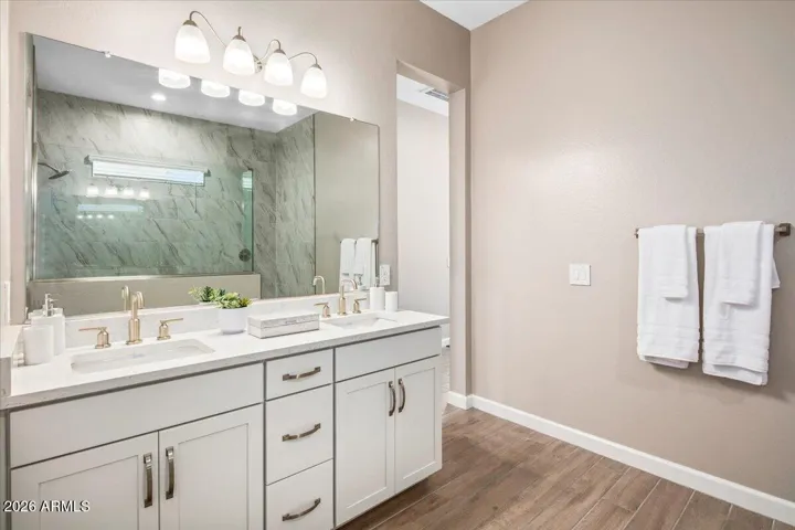 Vanity with dual, undermount sinks.Quartz countertop.
