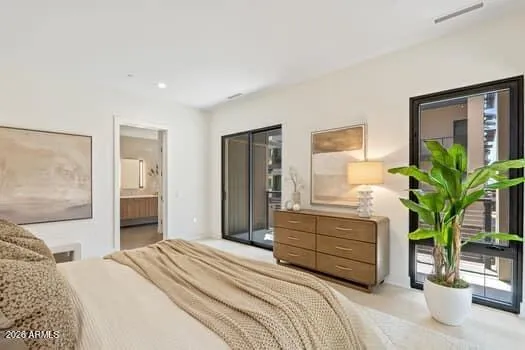 Additional space within the primary suite ideal for a sitting area or private lounge.