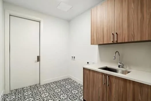 Dedicated laundry space with built-in storage and everyday practicality.