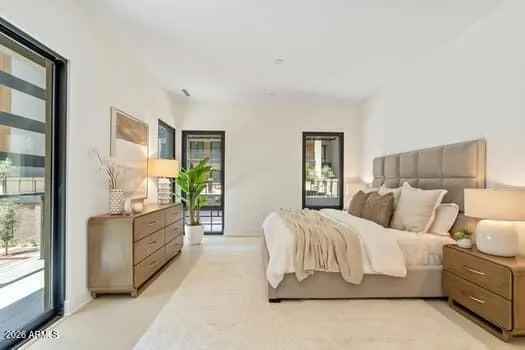 A tranquil primary retreat offering generous proportions and a refined, calming atmosphere.