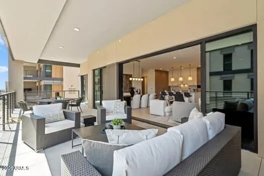 Open living space designed for comfort and style, with effortless flow to both kitchen and terrace.