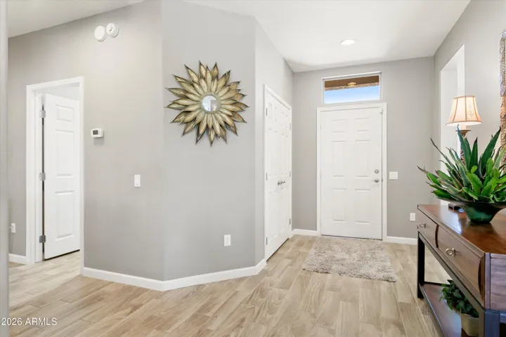 Tile flooring throughout the house except guest bedroom and office/den