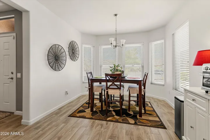 The breakfast nook has a bay window and looks to the front of the home.