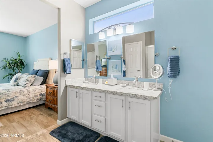 Bath vanity, lighting, mirrors and large walkin shower have been updated.
