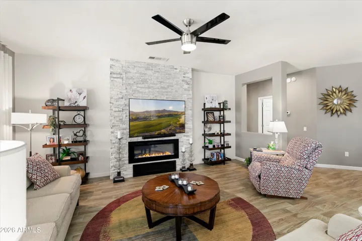 Beautiful stone media wall with electric fireplace.