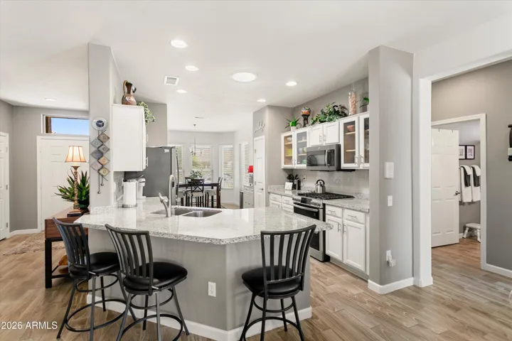 Lowered granite kitchen counter. This home is light and bright and has 2 solar tubes.