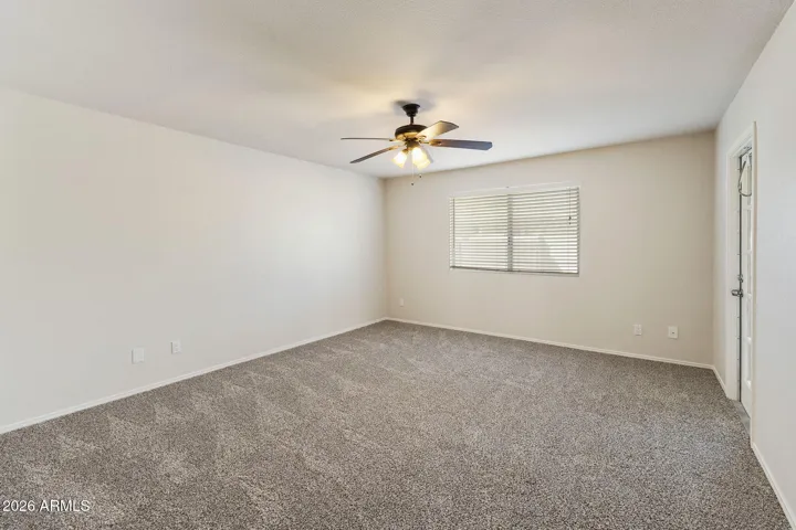 Primary bedroom with brand new carpet