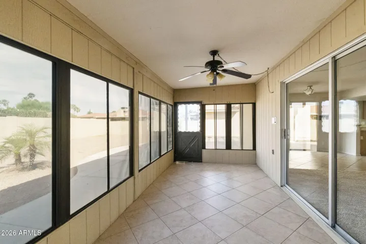 AZ room with exit to covered patio.