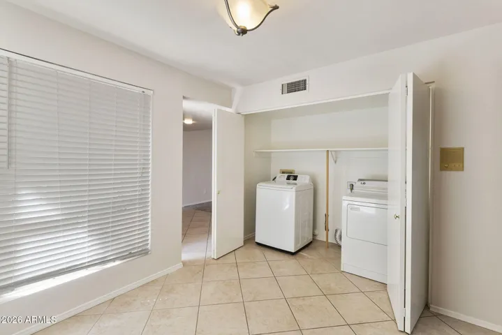 Laundry in Closet off Bonus room off Kitchen and Entry