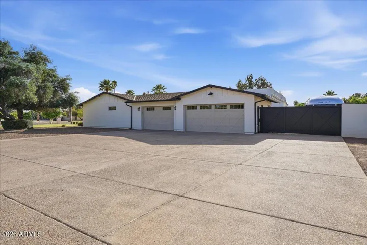 Rare 3+ Car Garage PLUS RV staging area and additional gated parking