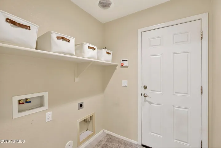 Laundry room downstairs off garage