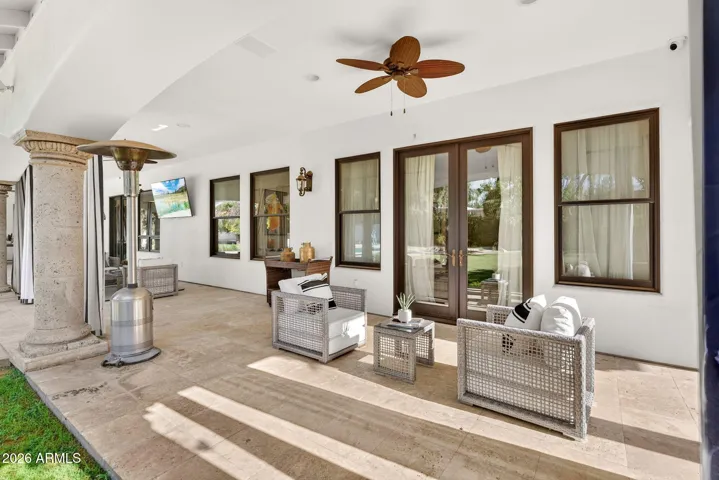 Your covered patio includes a sitting area outside the primary suite. Perfect for that morning cup of coffee.