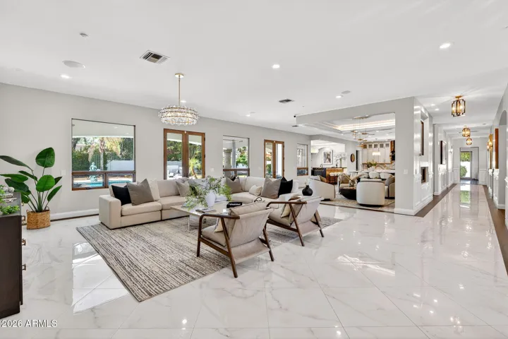 The exquisite marble and hardwood floors set the tone for sophistication and charm.