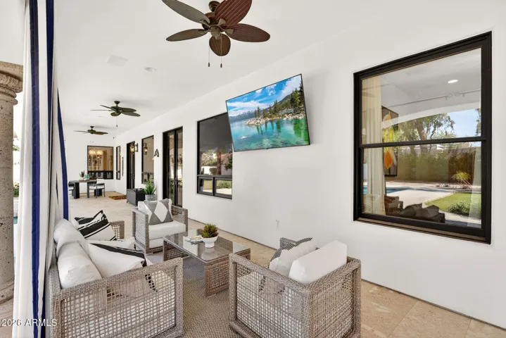 Your indoor/outdoor living is in full swing under this large covered patio space.