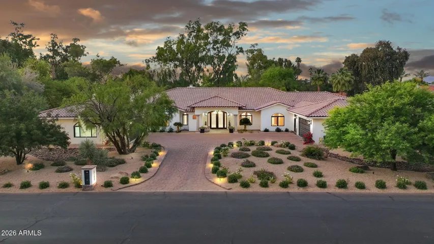 Welcome to this elegant and timeless Mediterranean estate in Paradise Valley