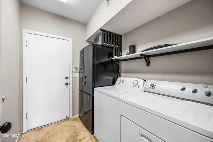 Laundry room can be outfitted with a cinema projector for a large display in the great room.