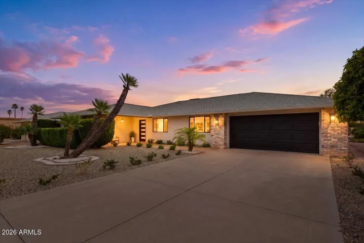 Full Remodeled with Custom Features and Accents! Front Patio! North and South Exposure! Updated Landscaping!