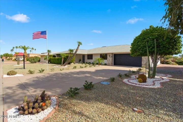 Full Remodeled with Custom Features and Accents! Front Patio! North and South Exposure! Updated Landscaping!
