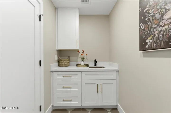 Laundry Area! Custom built in sink!