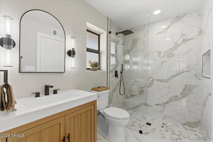 Second Bedroom Bath! Custom Hall Bath! Custom Curb-less Shower! Custom Glass Shower Panel! Nice Lighting!