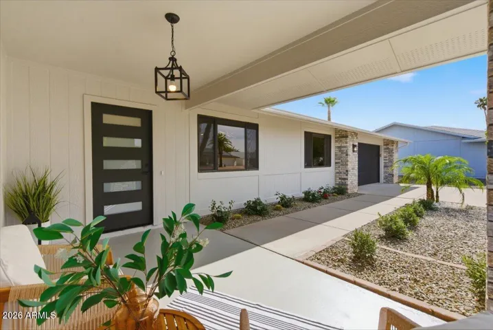 Full Remodeled with Custom Features and Accents! Front Patio! North and South Exposure! Updated Landscaping!