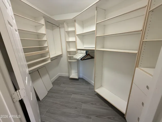 WALK-IN CLOSET W/ CUSTOM BUILT-INS