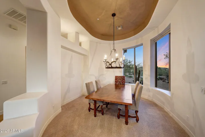 With views of colorful Arizona sunsets and natural desert landscaping
