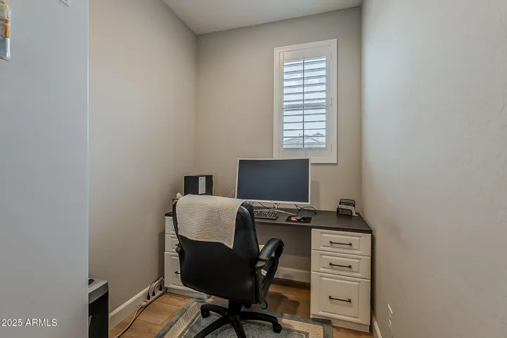 Room for a desk or could be used for additional storage.