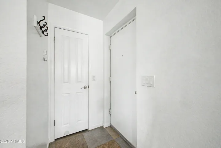 Front Door and Coat/storage Closet
