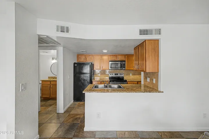 Kitchen open to Living and Dining Rooms