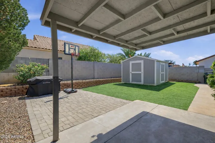 Backyard with dog kennel removed (and patio post... AI...haha)