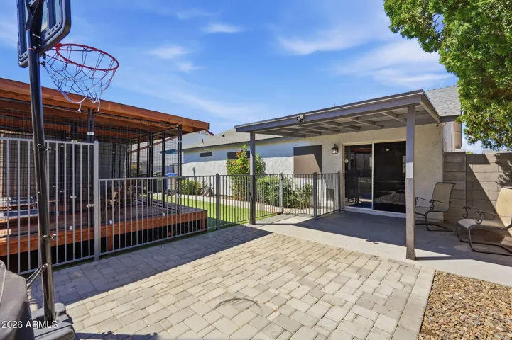 Paver area great for seating area, hot tub or game of hoops!