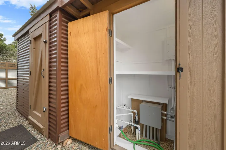 Located behind the Guest House, Utility Room and to the left is the Storage Room with power.