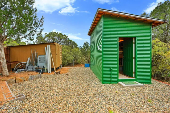 Located on the back side of property, these 2 shops are accessible through the 16'gate.