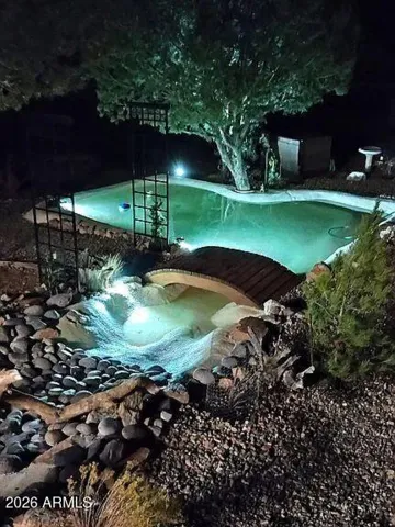 Pond served by pool pump and filters.