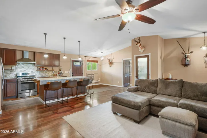 Note: Pantry access to lighted storage loft, extends above primary bedroom.