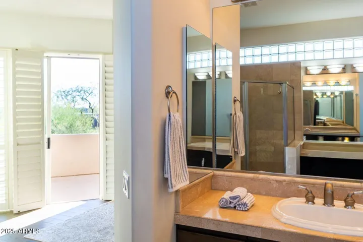Double vanities and a large walk-in closet.