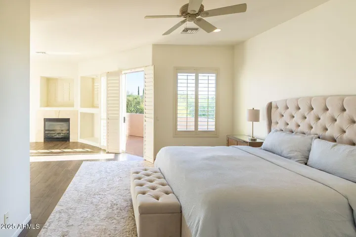 Spacious primary bedroom with en-suite balcony.