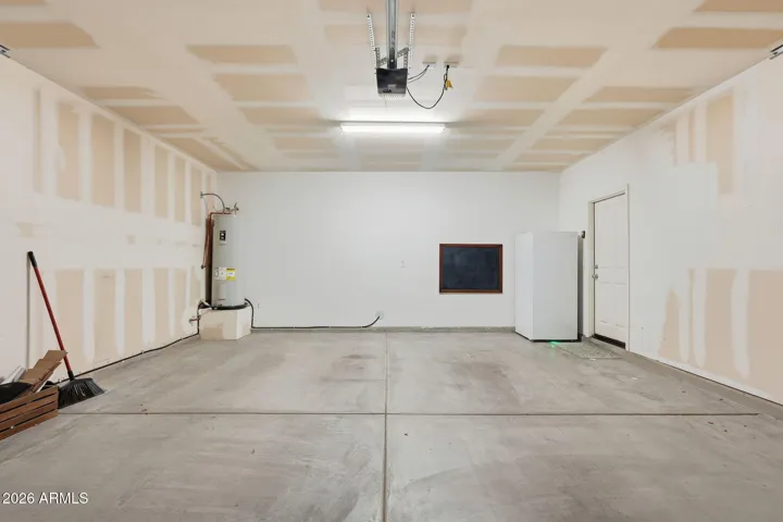 2 car garage with extended area for fridge/storage
